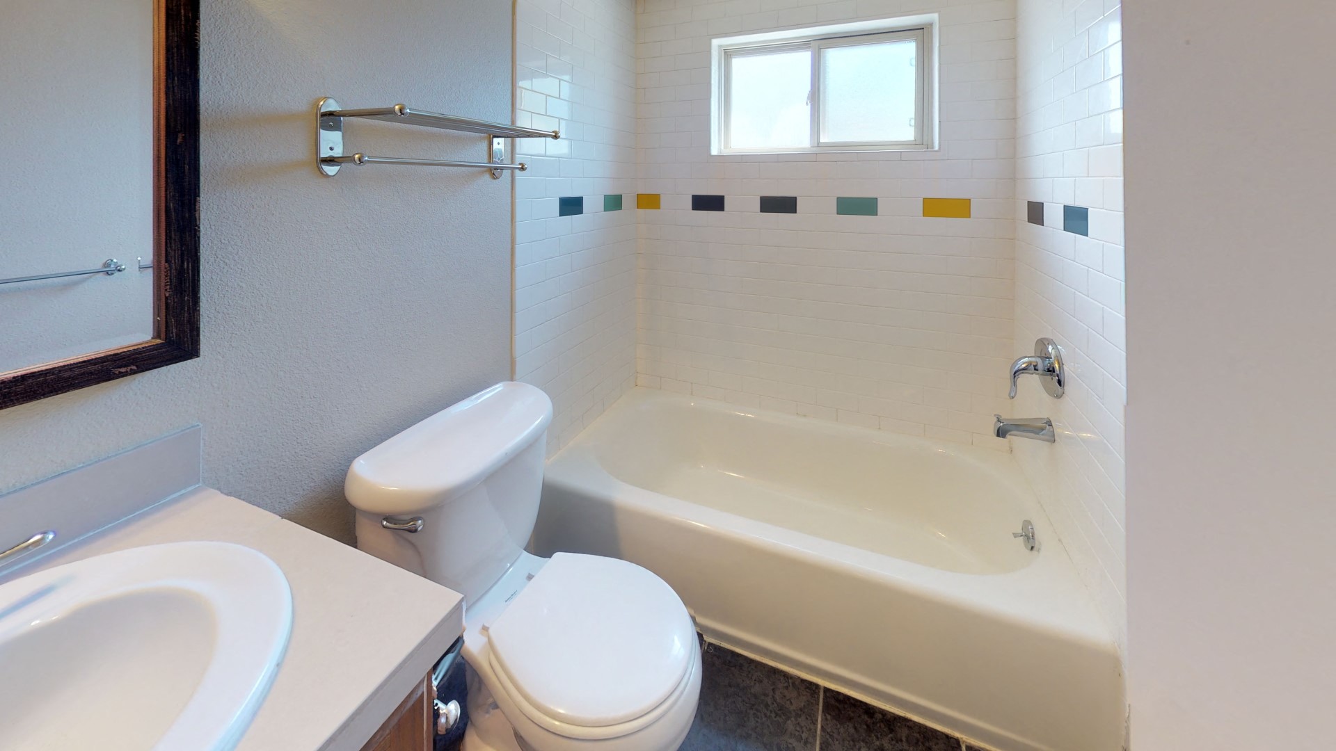 Bright and white bathroom at 1443 Elizabeth in Denver, CO
